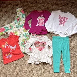 Girls 5-6T bundle of clothes. Rain jacket, new Nike set, tees